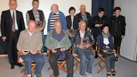 Vsi še živeči nastopajoči v filmu O življenju in delu rudarjem, z Damijanom Bogatajem (levo) in Tatjano Dizdarević in Martino Peljhan (desno)