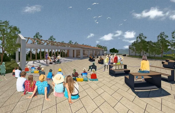 Tako približno bo videti nov mladinski center (levo) s prireditvenim platojem na Kozini severno od knjižnice (ta je 
vidna na sliki na desno, ob drevesih). 