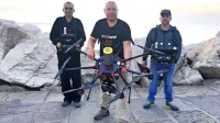 Janez Nebec (v sredini) s člani ekipe Onedrone na piranski Punti 

