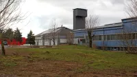 Občina bo novo parkirišče uredila za zdravstvenim domom.