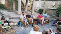 Z leve: Jure Vuga, Dejan Mehmedovič, Tomaž Perko in Luka Juri, 
ob  njem skica upodobitve Marije kot zvezde morij.  