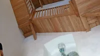Zvonik ima novo leseno konstrukcijo - stopnišče in v  niši  lik 
nadangela, ki ga je iz fuzije stekla izdelala piranska slikarka, 
keramičarka in restavratorka Mira Ličen Krmpotić.