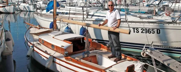 Piero Barcia je ponosen na svojo jadrnico Nibbio, ki se je letos 
udeležila že svoje 50. Barkolane.