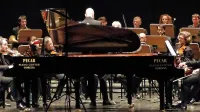 Pianista Aleksander Gadžijev (levo) in Giuseppe Guarrera sta oder delila s tremi združenimi orkestri Furlanije Julijske krajine.   