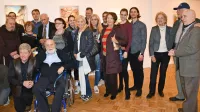 Filip Krtelj in Vojko Gašperut - Gašper (spredaj levo) s svojimi 
slovenskimi prijatelji v galeriji Sv. Cirila v New Yorku