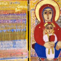 Marija z detetom, likovno klekljano delo črnovrškega oddelka 
Čipkarske šole in umetnikov Svetozarja in Leje Živković na 
osrednji razstavi UMET-NITKE v veliki grajski galeriji.