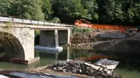 Do zime bodo obnovili in utrdili temelje suhorskega mostu, cestišče pa bodo zamenjali spomladi. Ob starem mostu so zgradili dva  
temelja in  nasipe - v dobri veri, da bi za čas obnove mostu tam postavili nadomestni most. A se je izkazalo, da bi to stalo preveč.