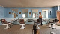 Salon Viktorja,   nato njegovega sina Janka Ozbiča (na fotografiji), 
je ohranil podobo in  opremo iz časa med obema vojnama.