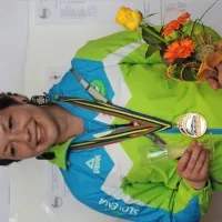 Lucija Mlinarič v zadnjem tekmovalnem letu 2014 - na sprejemu po 
dveh zlatih odličjih na evropskem prvenstvu. 