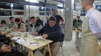 Družina Butul s Črtom na čelu (desno) je navdušila s ponudbo specialitet na kar se da nenavadnem kraju bivšega idrijskega 
rudnika.