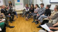 Pogovor o stripu o J. A. Scopoliju na kulturnem maratonu idrijske 
gimnazije (prva med organizatorji, Maja Justin Jerman, stoji).