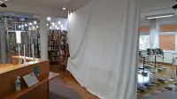 Švicarji pomagajo knjižnici