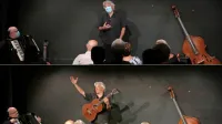 Iztok Mlakar in glasbenik David Šuligoj sta večer pričela z 
maskama ... in ga že po nekaj minutah nadaljevala, kakor se 
spodobi:   s širokim nasmehom in z radoživo pesmijo.