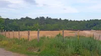 Odpadno blato je poleti končalo tudi na zemljišču, ki je v lasti države, v Lokvi. Nato so blato zasuli. 