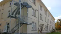 Okužene stanovalce iz postojnskega doma Talita kum  bodo danes  
selili v rdečo cono, ki so jo vzpostavili  v  prostorih Podjetniškega 
inkubatorja v Velikem Otoku.