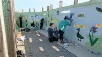 Dijaki so s tematskimi grafiti poslikali opazovališče pod ankaransko cesto v Škocjanskem zatoku.