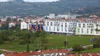 Projekt 2020 je 16.636 kvadratnih metrov veliko zemljišče med 
TPC Livade in “Mišičevimi bloki” kupil po izklicni ceni - za  
2,376.000 evrov. Na njem snuje gradnjo 175 stanovanj.    