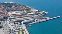 V občini opozarjajo, da je območje nekdanje ladjedelnice pomembno za videz Izole in da bo treba  dvigniti obalo.    