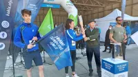 Baklo so v Bovcu skupaj z olimpionikom Miranom Gašperšičem 
prevzeli prepoznavni domači športniki.  