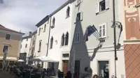 Palača Manzioli, primer zgledno izpeljane obnove