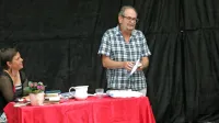 Marko Kravos je v Hiši kulture v Svetem Antonu deževen dan 
razsvetlil z vedro poezijo.