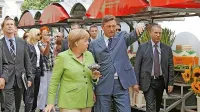 Angelo Merkel je med njenim obiskom v Ljubljani po središču 
mesta popeljal takratni predsednik slovenske vlade Borut Pahor.