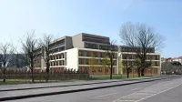 Nasproti niza stolpičev ob Ulici Istrskega odreda v Olmu bodo  
zgradili Deos Center starejših Koper.