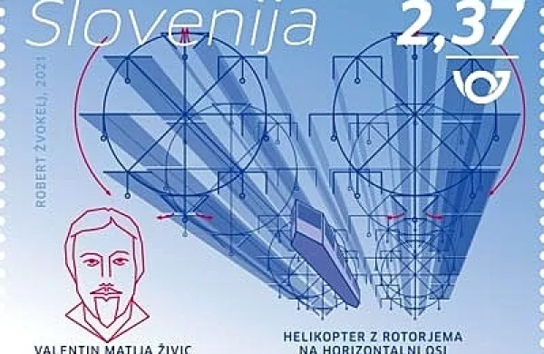 Znamko s podobo Valentina Matije Živica in z njegovimi izumiteljskimi 
načrti  za helikopter je oblikoval Robert Žvokelj.