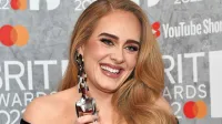 Adele je domov odnesla kar tri kipce -  za pesem, album in izvajalko 
leta.