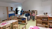 Devet mesecev po požaru se je 96 malčkov  vrnilo v  prenovljen  
vrtec.