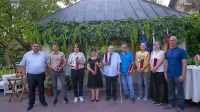 Letošnji nagrajenci Občine Idrija, glavna nagrajenka - Ivana 
Leskovec in častni občan Franci Jereb, sta četrta in peti z leve.