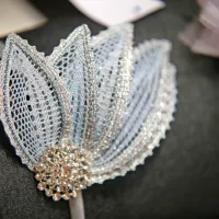     Na razstavi so bili tudi unikatni kosi nakita s čipko, nekateri so bili  naprodaj. 