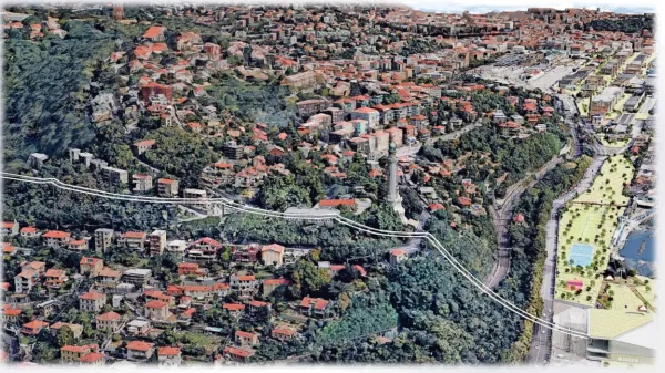 V prikazu teče žičnica preblizu železnice in predaleč od svetilnika, 
pod njo pa je gozd, ki ga bodo morali posekati.