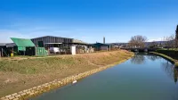 Nov pogled na KZ Agrario, potem ko je padlo okoli 70 dreves, ki naj 
bi ogrožala splošno varnost. 