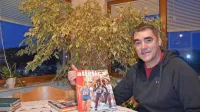 Rafko Marinič z italijanskim atletskim letopisom za leto 1992, ko je 
dvakrat  odtekel  državni rekord na 800 metrov.