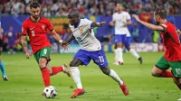 N'Golo Kante (v sredini) je po arabski pomladi v francoskem dresu 
znova zadihal s polnimi pljuči.  