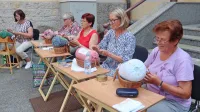 Klekljarice cerkljanskega društva Marjetica imajo v muzeju na 
ogled razstavo čipk, ki so jih posvetile 170. letnici rojstva 
goriškega nadškofa dr. Frančiška Borgia Sedeja.