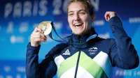 Najlepši dan v Andrejinem življenju: z zlato olimpijsko medaljo za 
zmago med judoistkami do 63 kg.