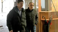 Dolgoletni vodja koprskih kriminalistov Dean Jurič in njegov odvetnik 
Uroš Leban pred Delovnim in socialnim sodiščem v Ljubljani.