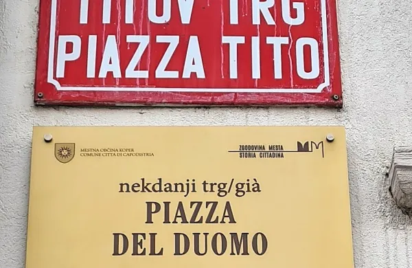 Na novi različici je pri besedi nekdanji še pojasnilo, da gre za 
trg/ulico/nabrežje. 