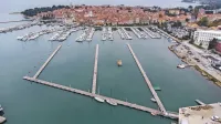Med  velikonočnimi prazniki bo v Izoli  živahno tudi  zaradi jadralne 
regate Izola Spring Cup in prvega letošnjega Pomola okusov.  