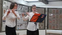 Flavtistki Petra Marinko Rus in Milanka Trušnovec na slavju in 
razstavi ob 75. obletnici filatelističnega društva Idrija.