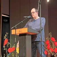 Sandi Vrh je govor prebral s pomočjo brailove pisave. 