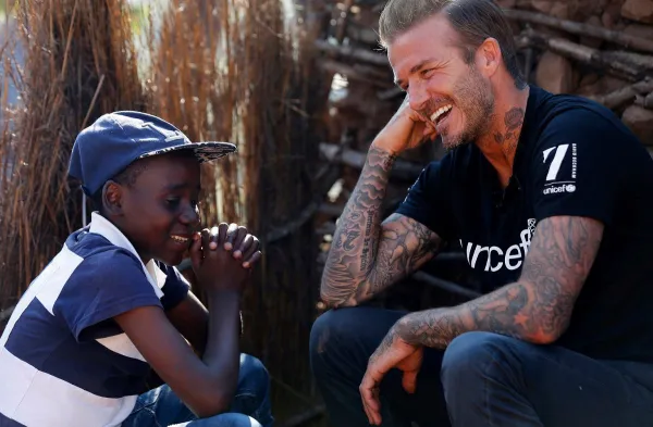 ﻿UNICEF Goodwill Ambassador David Beckham meets Sebenelle, 14, in Makhewu, Swaziland, on June 7, 2016, who receives the 7 Fund support in management of malnutrition in HIV positive children. Beckham travelled to Swaziland to see how 7: The David Beckham UNICEF Fund is helping UNICEF to provide life-saving treatment, care and support to HIV-positive children. During his visit Beckham learnt how the worst drought in decades – now taking hold on vast swathes of Eastern and Southern Africa – is threatening to wreak havoc on the lives of children and families already made vulnerable by HIV. Makhewu, Swaziland, June 7, 2016. © UNICEF/Swaziland/Modola16