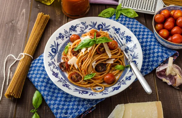 Wholemeal pasta with roasted tomato and garlic, homemade tomato salsa,Image: 314917989, License: Royalty-free, Restrictions:, Model Release: no, Credit line: Petr &Scaron;těp&aacute;nek/Alamy/Profimedia