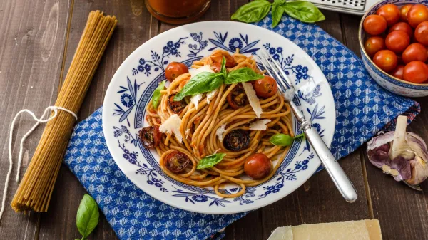 Wholemeal pasta with roasted tomato and garlic, homemade tomato salsa,Image: 314917989, License: Royalty-free, Restrictions:, Model Release: no, Credit line: Petr Štěpánek/Alamy/Profimedia