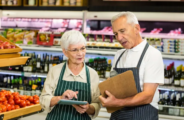 Senior colleagues with clipboard working in supermarket,Image: 279953196, License: Royalty-free, Restrictions:, Model Release: yes, Credit line: -/Wavebreak/Profimedia