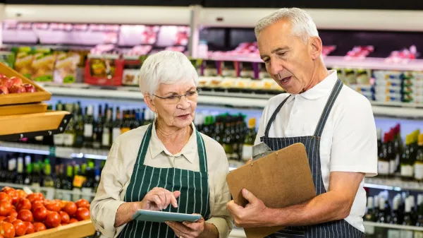 Senior colleagues with clipboard working in supermarket,Image: 279953196, License: Royalty-free, Restrictions:, Model Release: yes, Credit line: -/Wavebreak/Profimedia