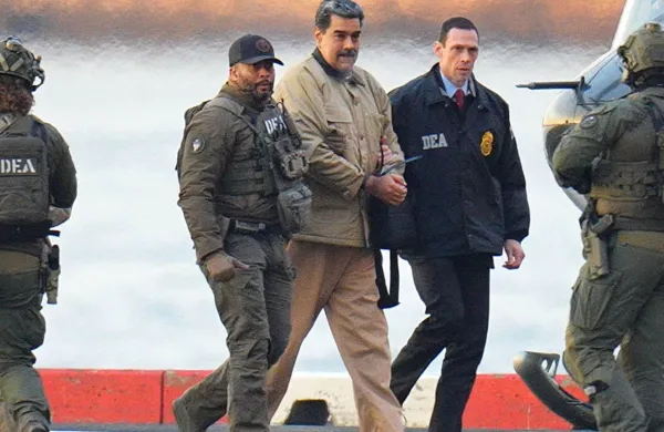 Nicolas Maduro and his wife, Cilia Flores, are seen in handcuffs after landing at a Manhattan helipad, escorted by heavily armed Federal agents as they make their way into an armored car en route to a Federal courthouse in Manhattan on January 5, 2026 in New York City.,Image: 1063517823, License: Rights-managed, Restrictions:, Model Release: no, Credit line: XNY/StarMax/Profimedia