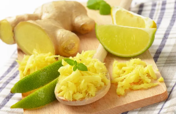 grated fresh ginger root with lime on wooden cutting board,Image: 295932349, License: Rights-managed, Restrictions:, Model Release: no, Credit line: -/Digifoodstock/Profimedia